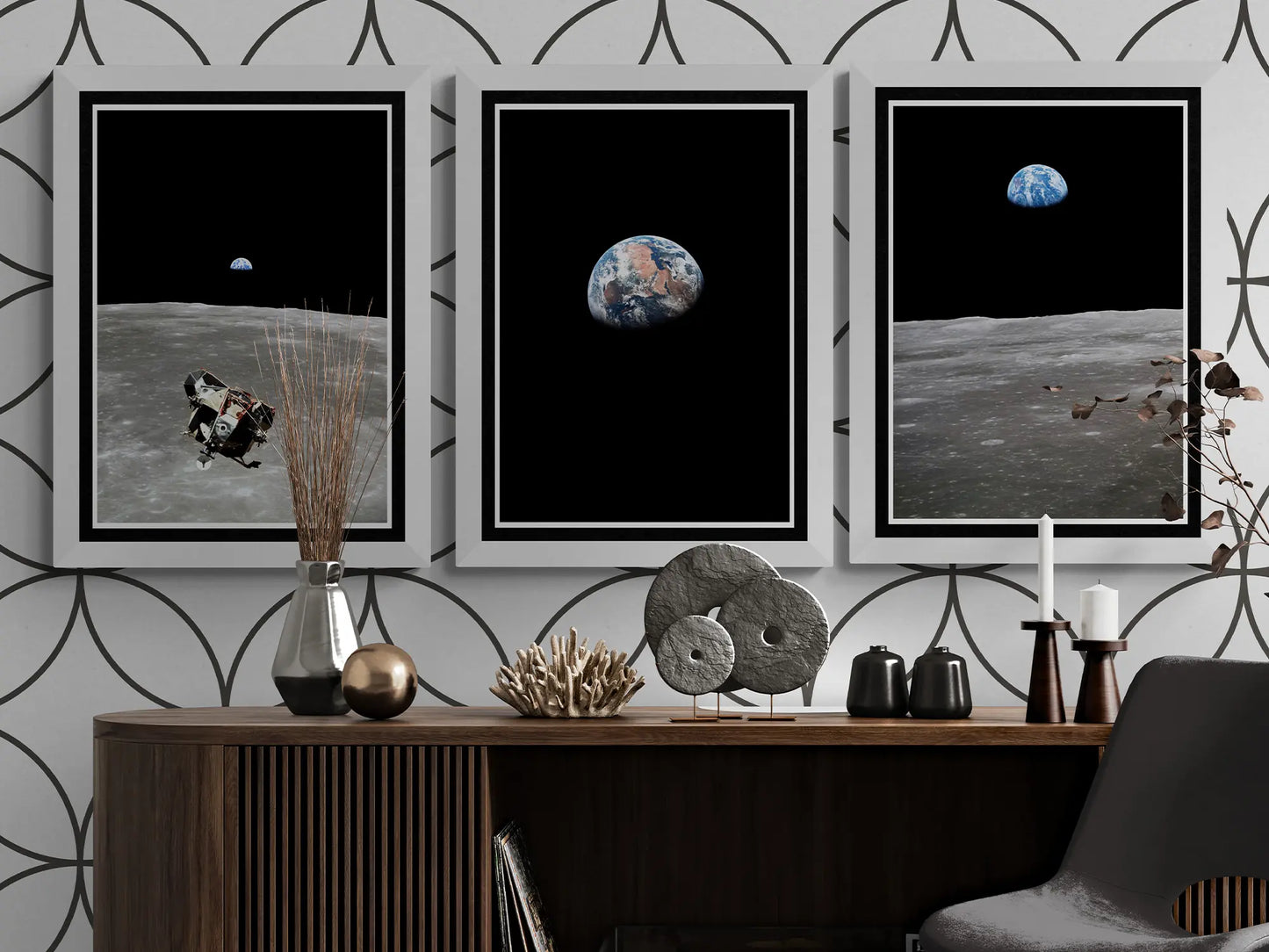 Apollo 11 poster set featuring Earthrise, the Moon’s surface, and the Lunar Module, framed and styled in a modern interior with a wooden console and geometric decor.