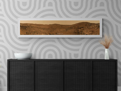 Mars panoramic wall art mockup with the Spirit Rover image, displayed in a stylish home interior setting above a dark cabinet