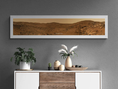 Mars Spirit Rover panoramic wall art displayed in a contemporary home setting with a white and wooden console, decorative plants, and vases.