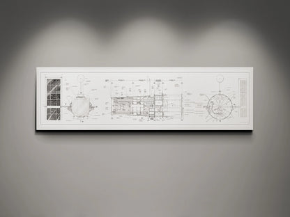 Hubble Space Telescope Blueprint | Rocket Blueprint Posters | A white-framed blueprint of the NASA Hubble Space Telescope, featuring detailed engineering schematics in black on a white background. The blueprint is displayed on a gray wall under gentle overhead lighting.