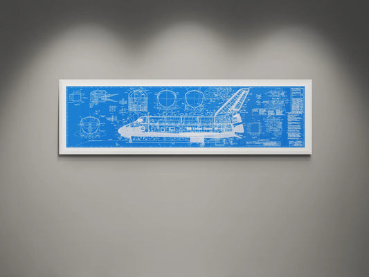 Framed NASA space shuttle blueprint wall art featuring detailed white engineering schematics and technical diagrams on a blue white  background, displayed on a modern gray wall.