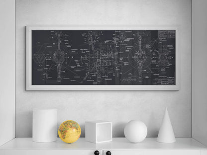 Voyager Space Probes Blueprint | Rocket Blueprint Posters | NASA | JPL | Modern art display with a white cabinet holding abstract sculptures and a yellow globe. A charcoal-colored Voyager Probes blueprint in a white frame, detailed with precise white technical drawings, adorns the wall above.